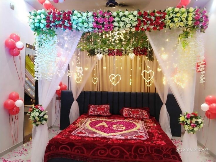 first night decoration with heart shape flowers and heart shape lights